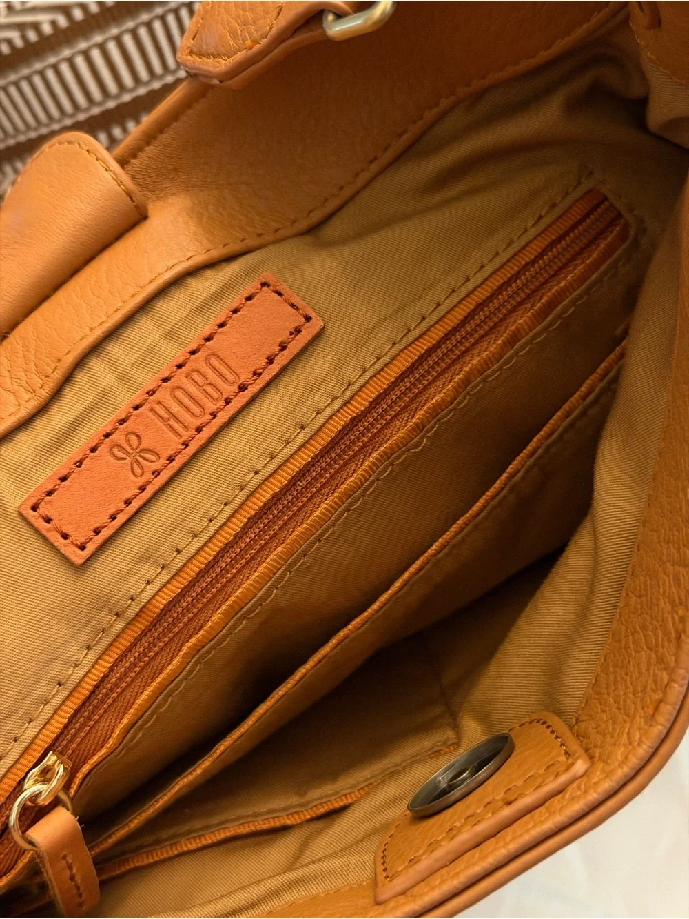 HOBO structured leather